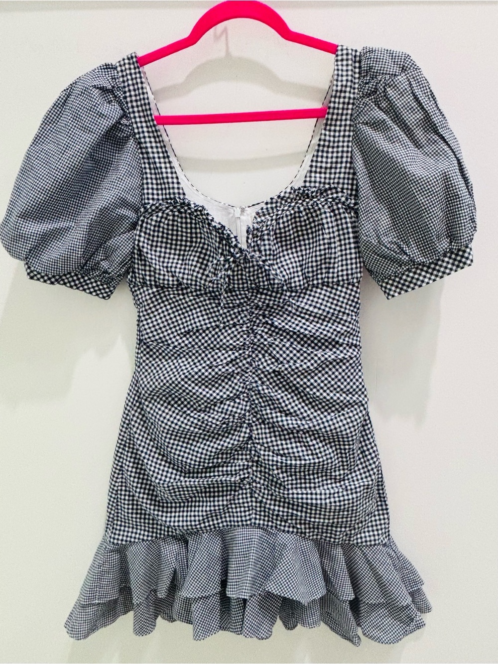 Black and white gingham mini dress with puff sleeves